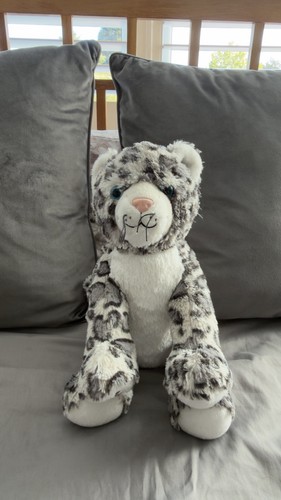 Adorable snow leopard - snow, plush